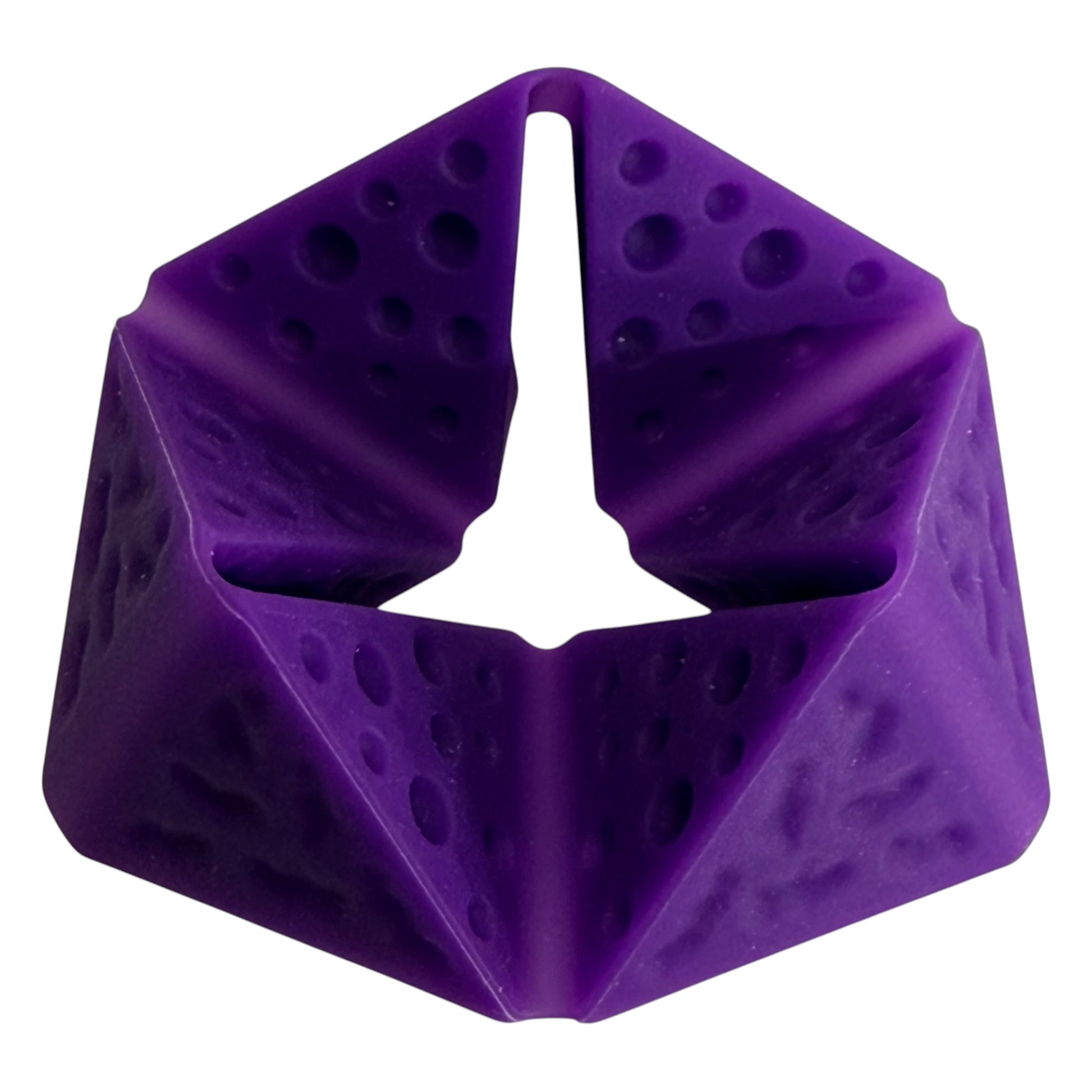 Purple Kaiko FLIPPI sensory tool folded mid-flip showing textured silicone panels
