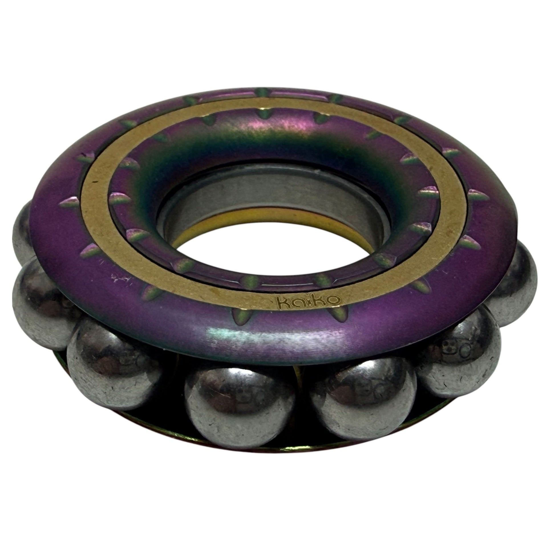 Freewheel Spinner in oil slick finish showing stainless steel balls