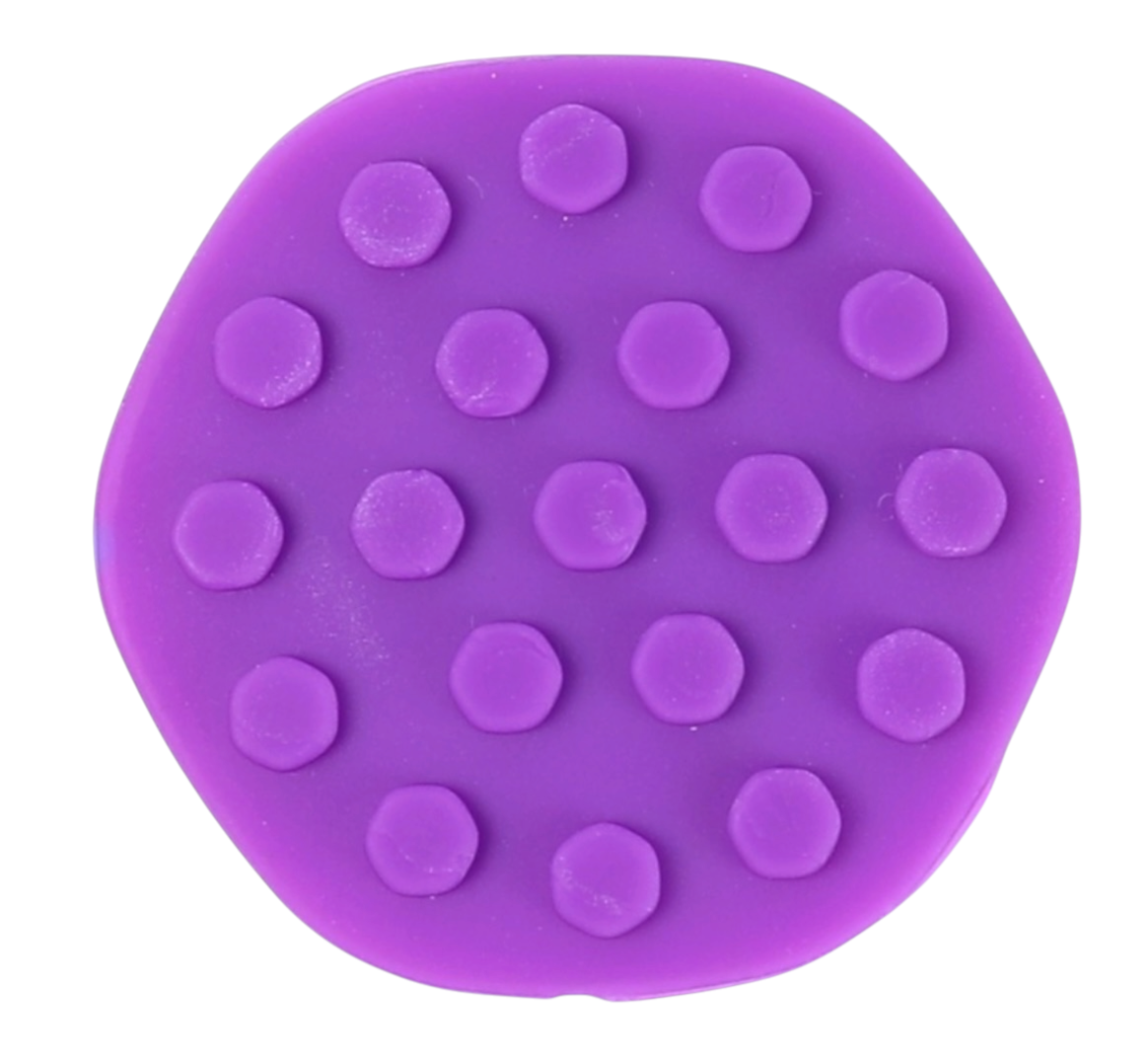 Close-up of the raised tactile texture on a purple Kaiko POPPI sensory tool