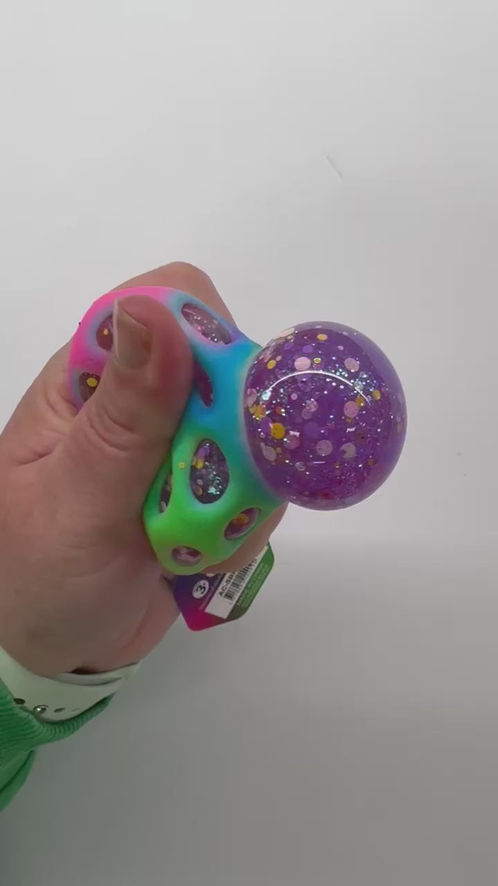 Load video: Glitter Rainbow Squishy Ball Keychain