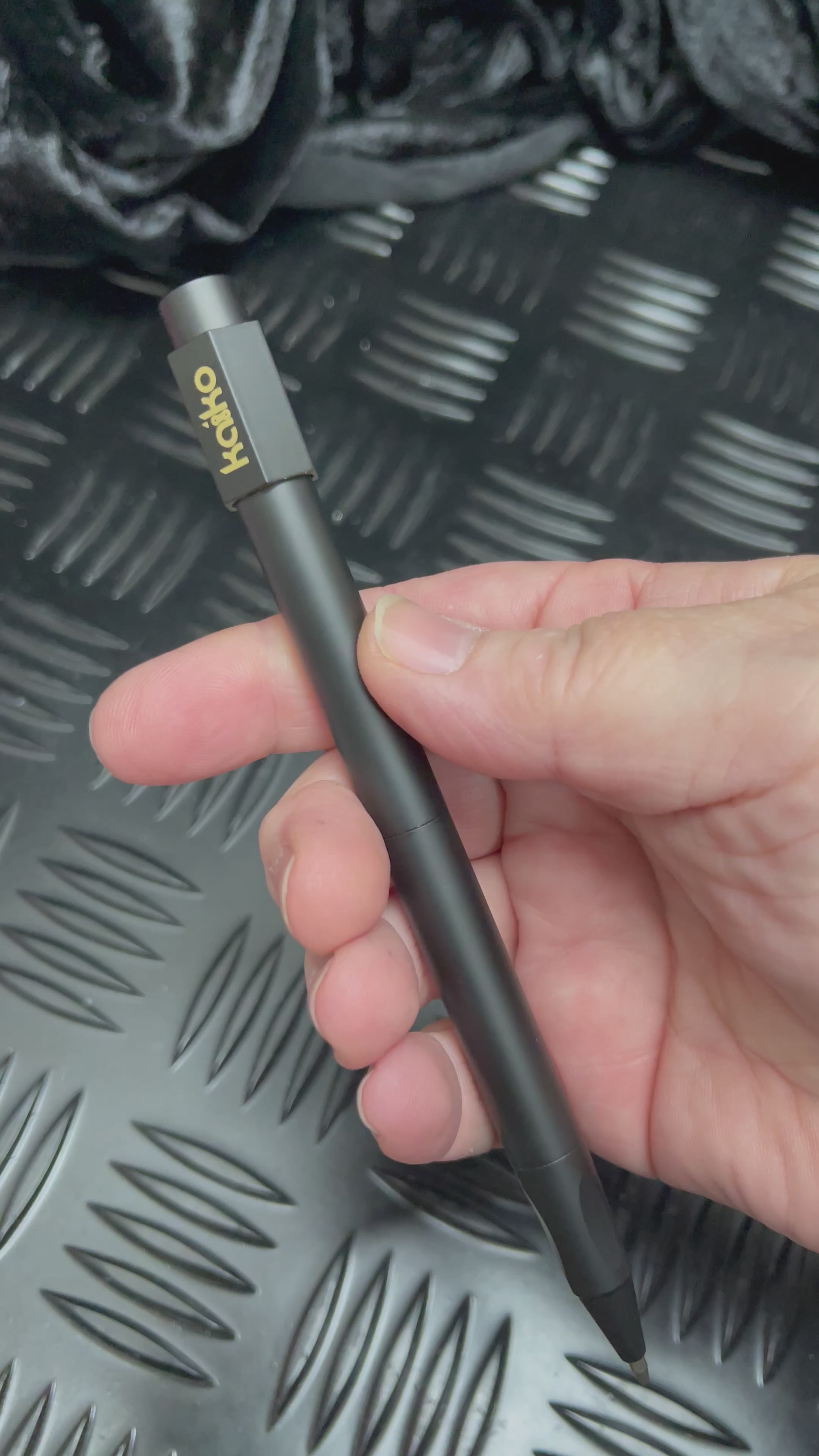 Load video: BLACK Weighted Spinner Pen with 4 refills