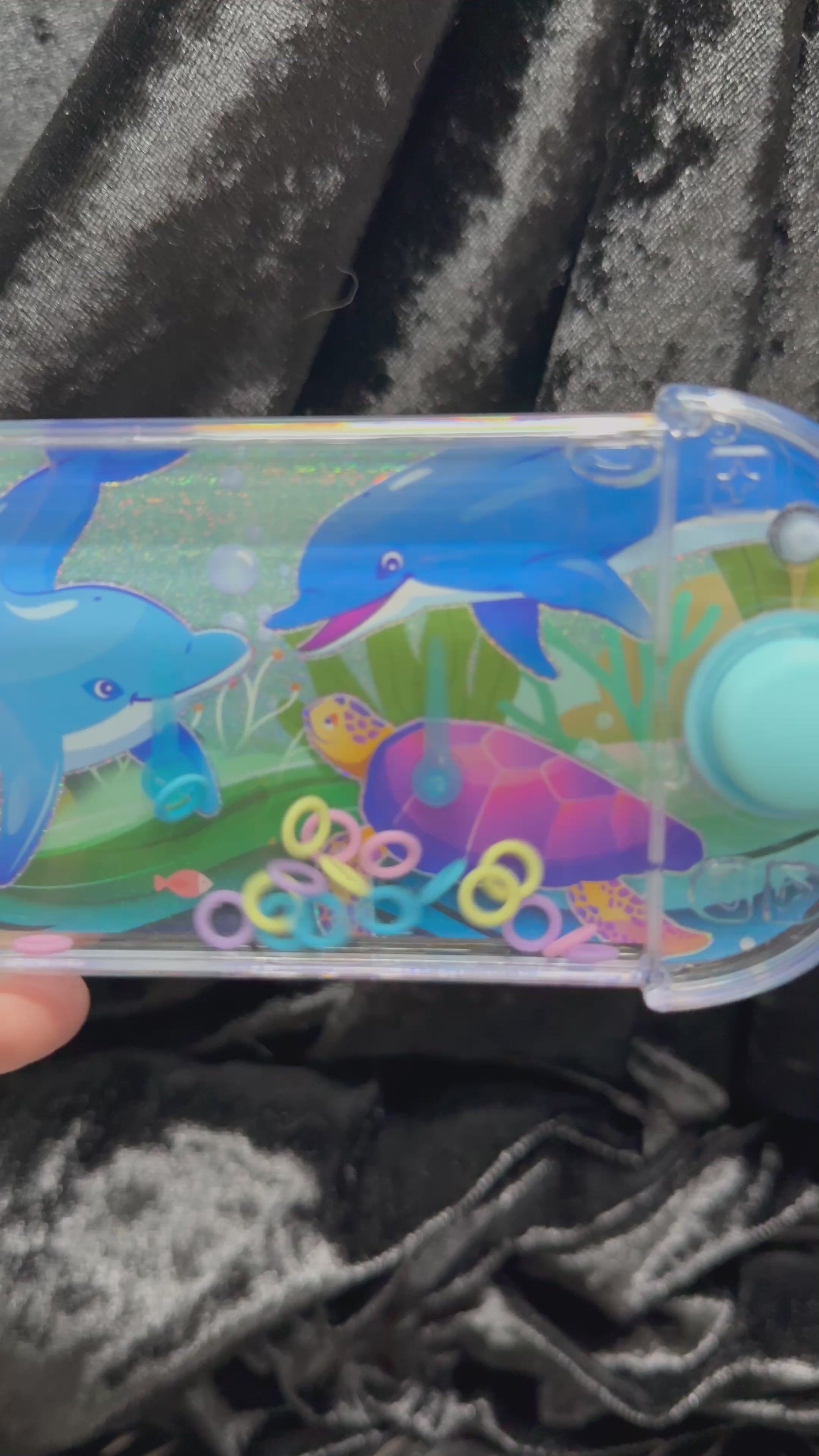 Load video: Retro Water &amp; Ring Hand Held Sea Themed Game