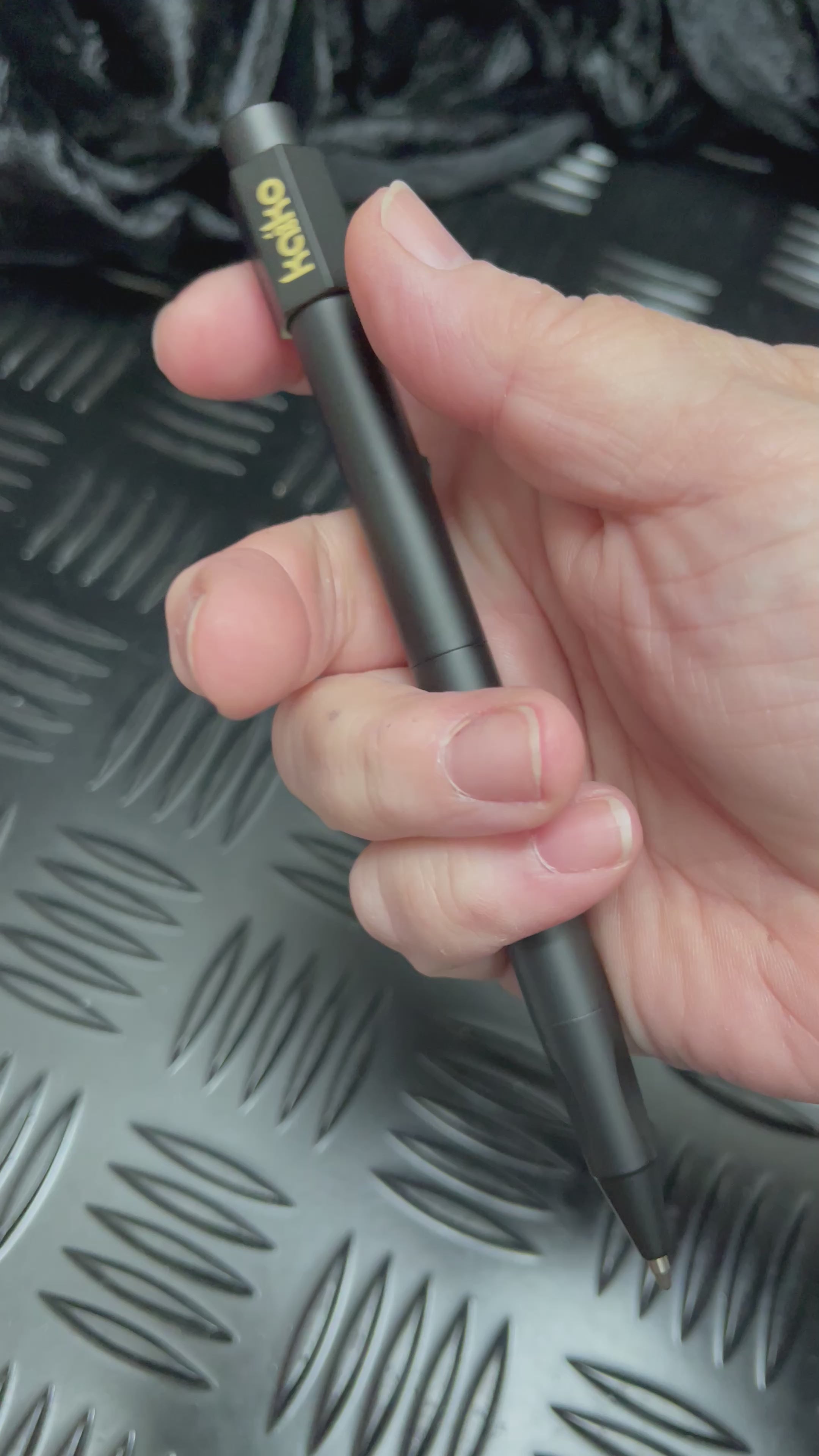 Load video: BLACK Weighted Spinner Pen with 4 refills