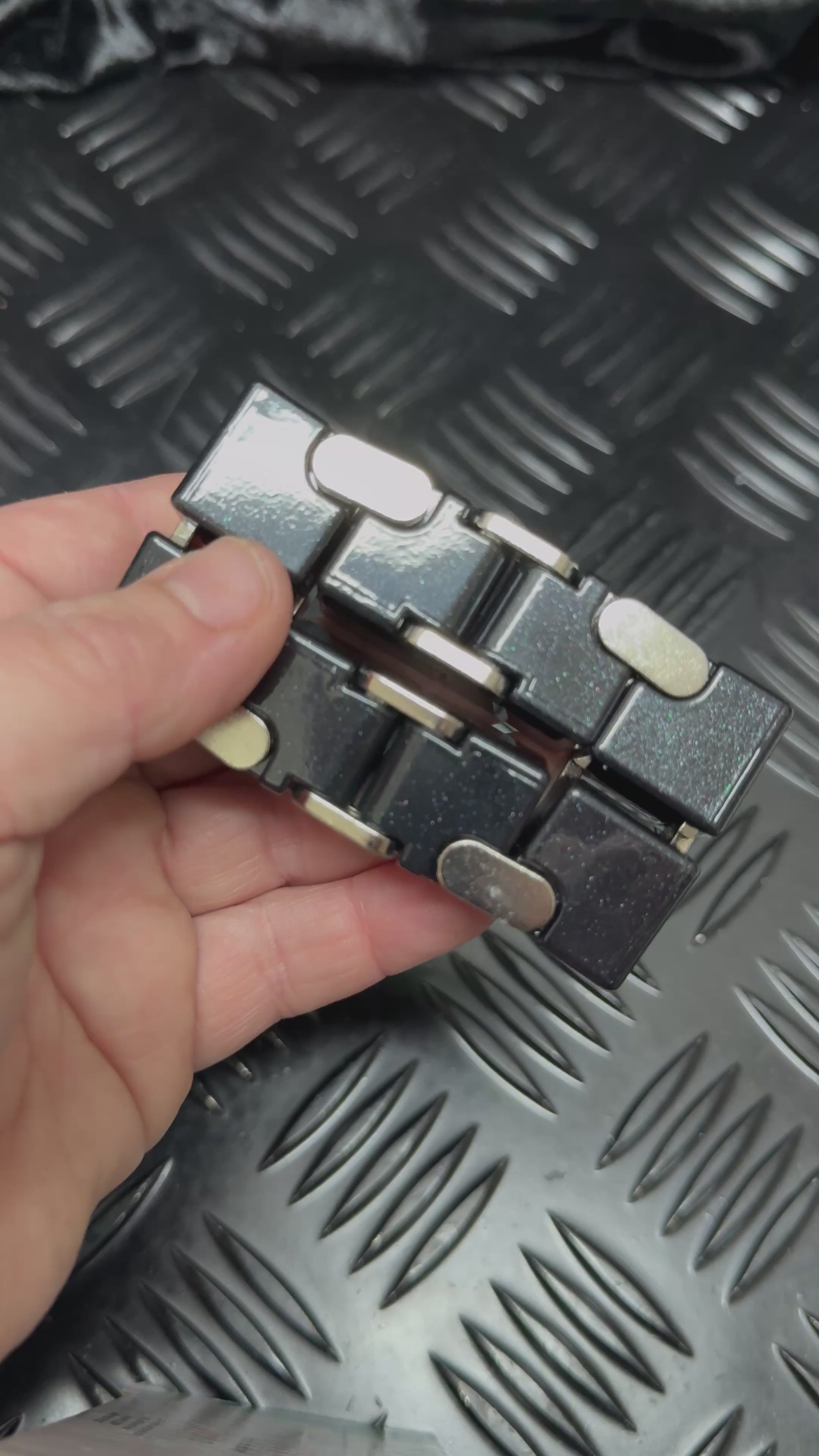 Load video: BLACK Metal Infinity Cube Fidget
