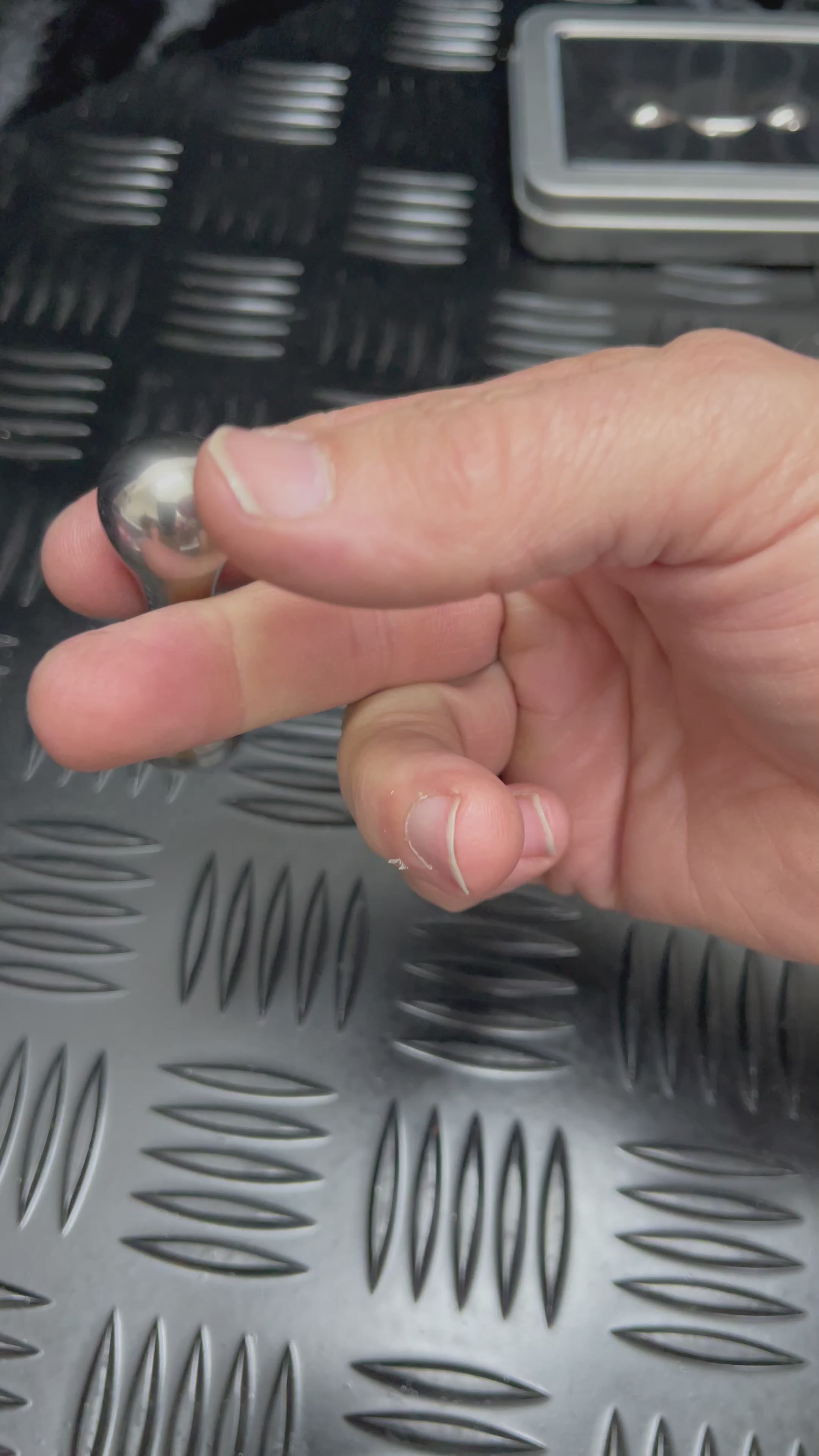 Load video: Titanium Fidget Bone by kaiko