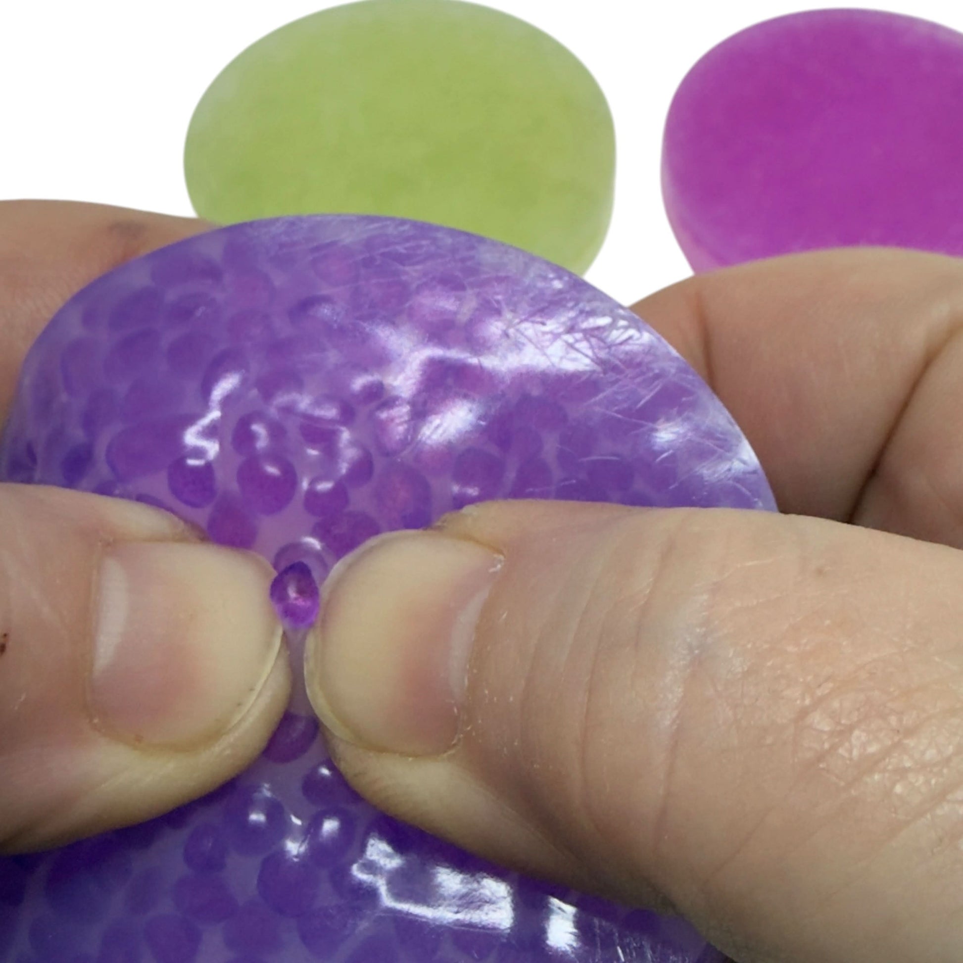 Purple Vivid Stretchy Pick 'Em close-up showing embedded glass pebbles
