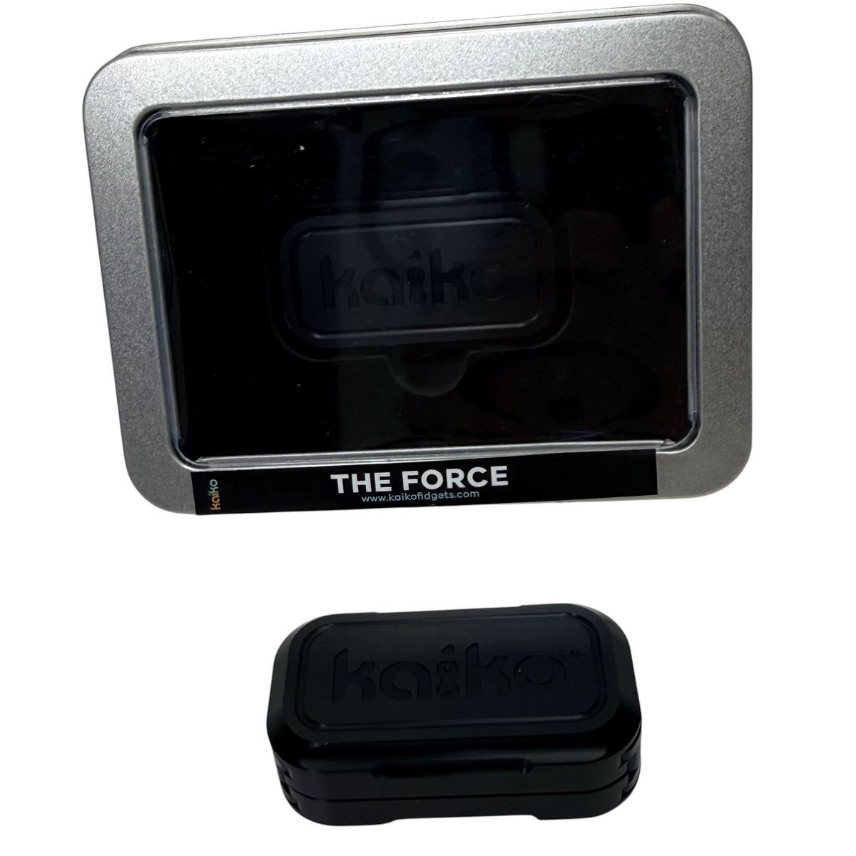 The Force by Kaiko magnetic slider closed beside presentation tin