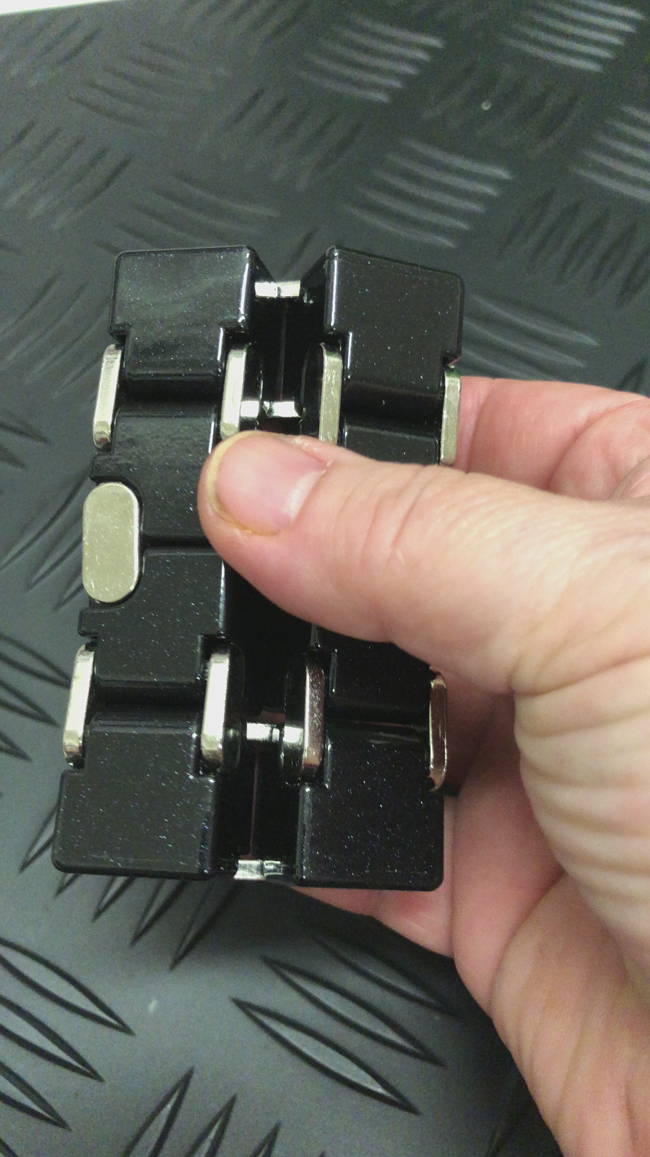 Load video: BLACK Metal Infinity Cube Fidget